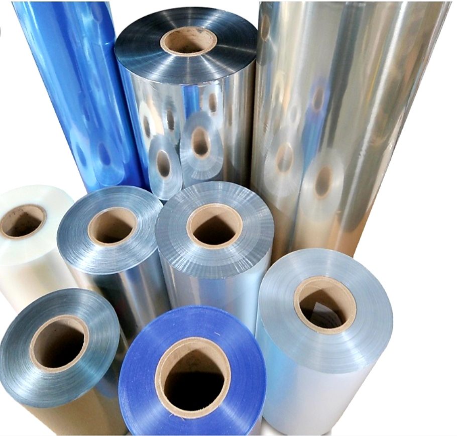 Rolls of clear, silver and blue packaging film on cardboard cores